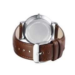 Reloj de pulsera de metal de cuarzo redondo con esfera de cuero marrón